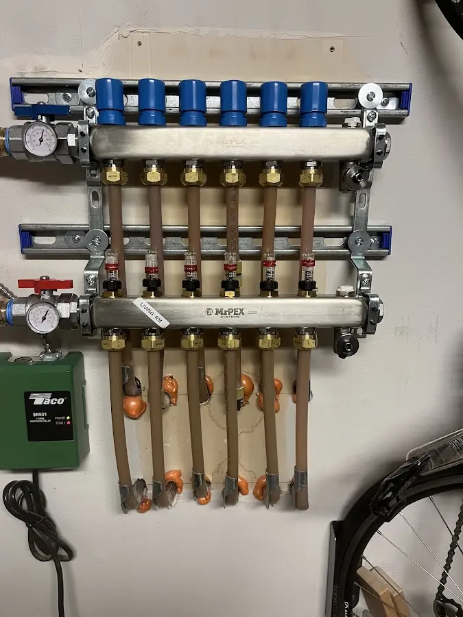 Plumber performing Leak Detection at a residential property in Ashton-Sandy Spring